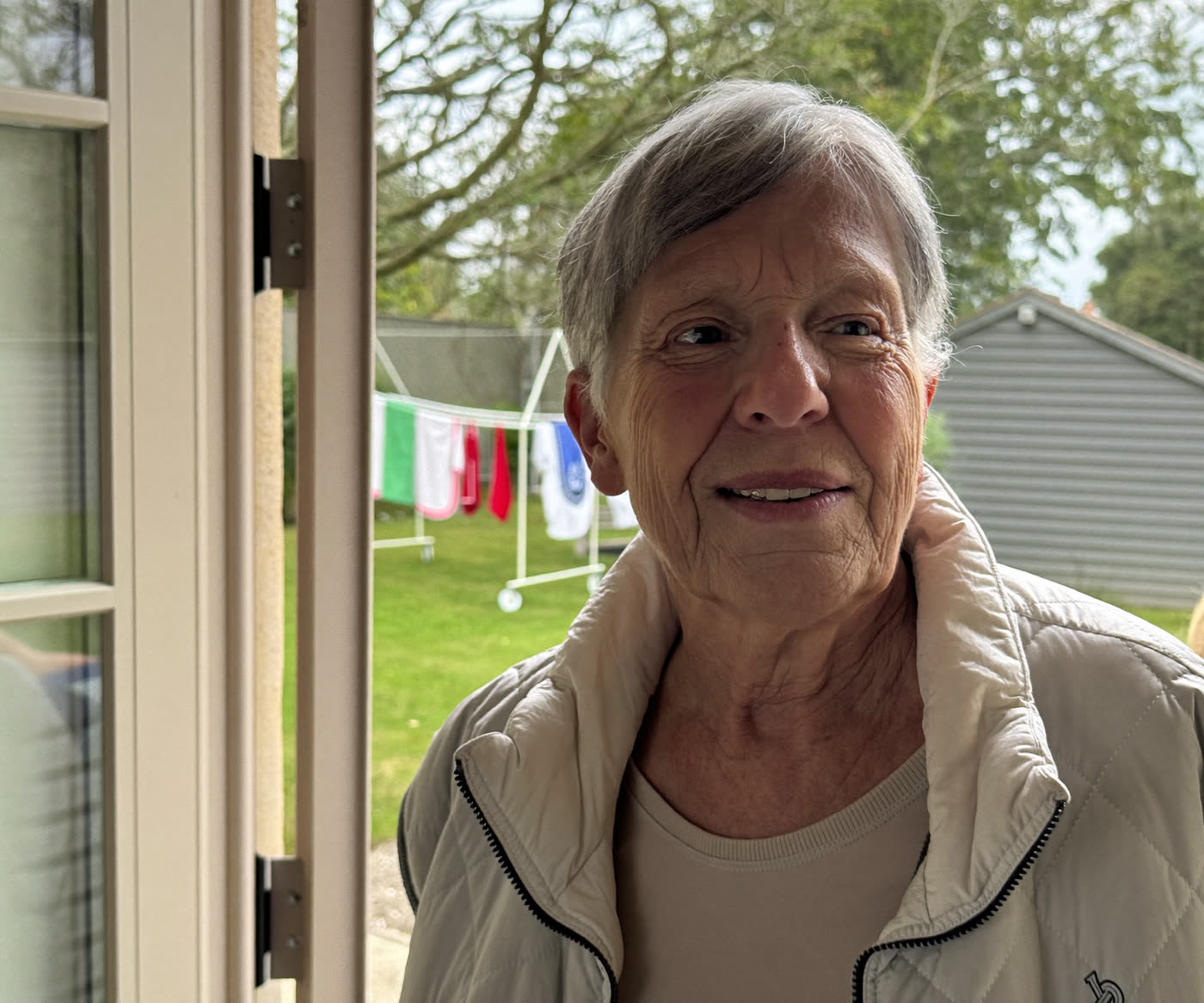 A woman in her sixties in her own kitchen
